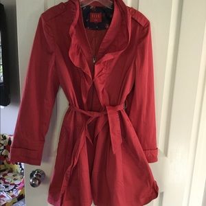 Light wear coat with ruffled details.